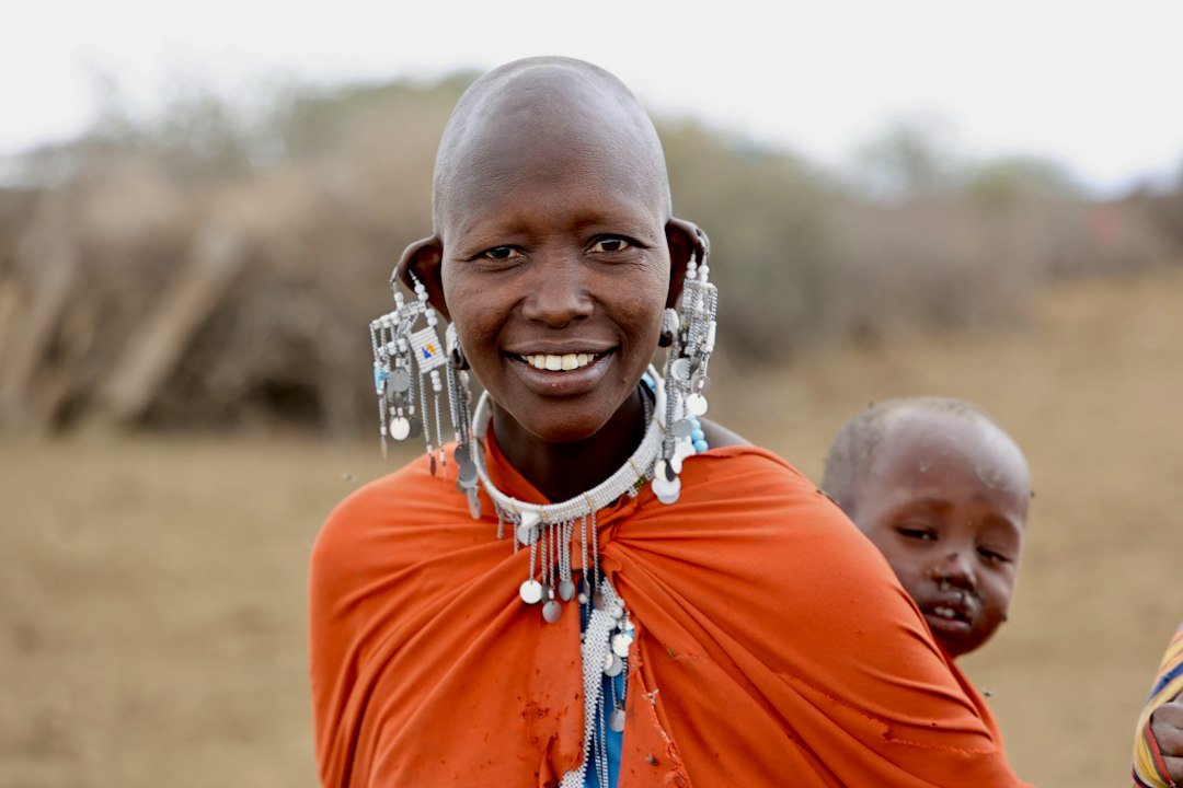 Maasai woman at Kilimanjaro National Park — cultural day-trip illustration