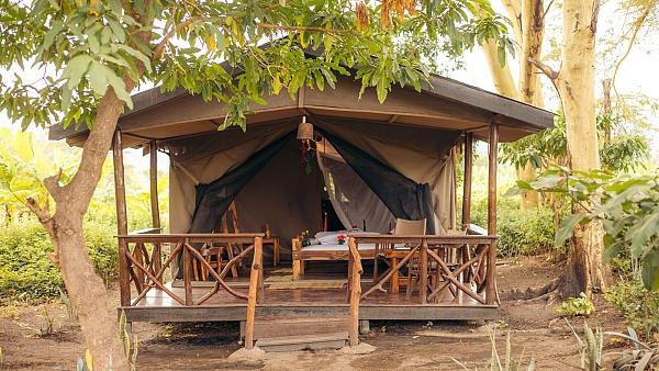 Raised tent and veranda at Migunga Tented Camp — accommodation with Tartaruga Safaris
