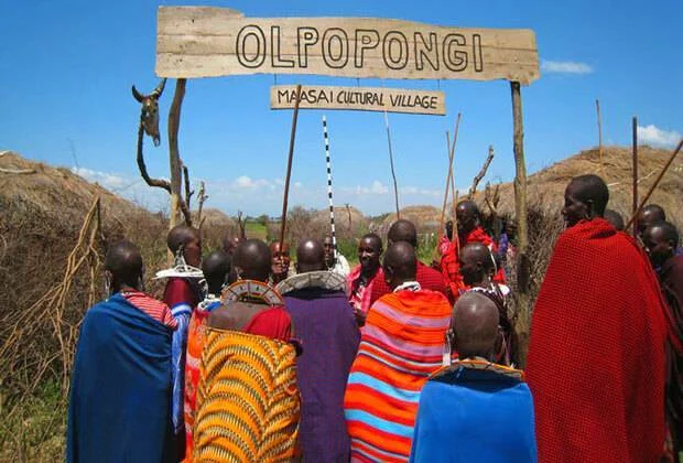 Visitors approaching the Olpopongi Maasai village entrance