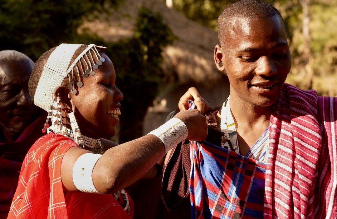 People preparing for a celebration in traditional dress — Olpopongi overnight illustration