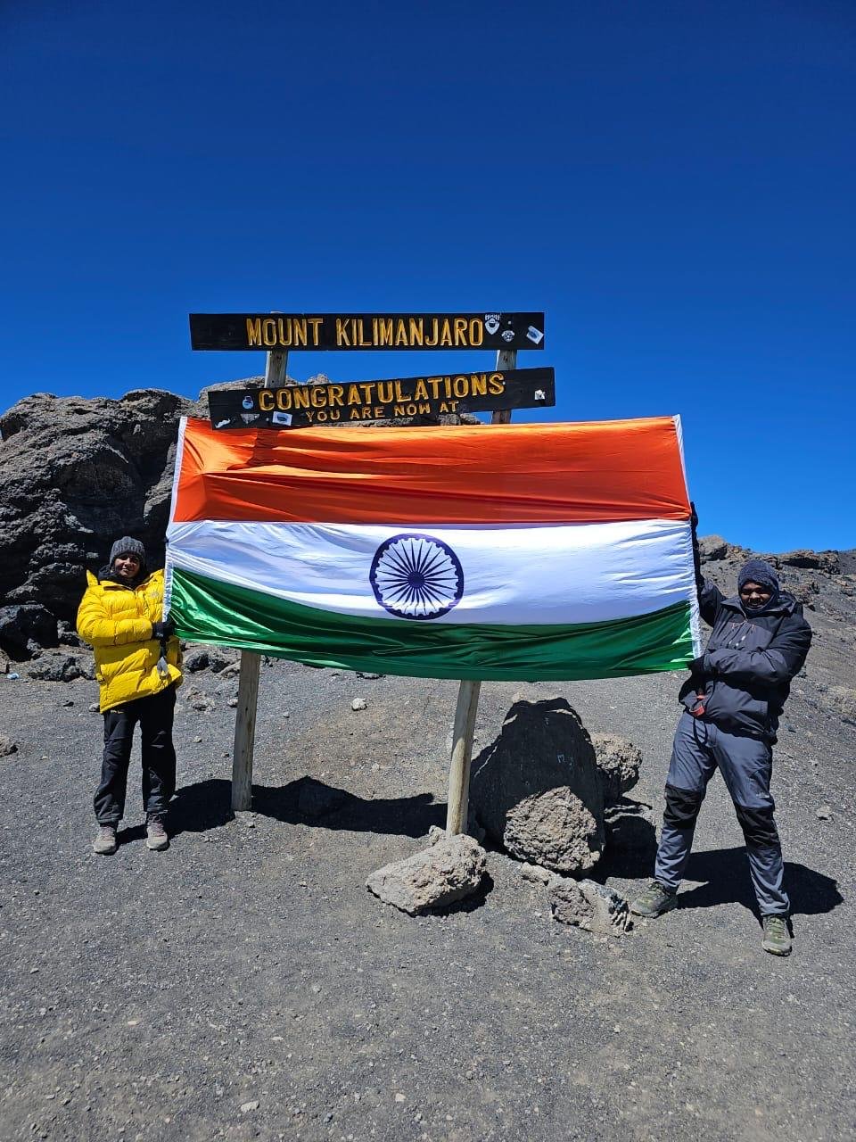 Climbers at the summit of Mount Kilimanjaro