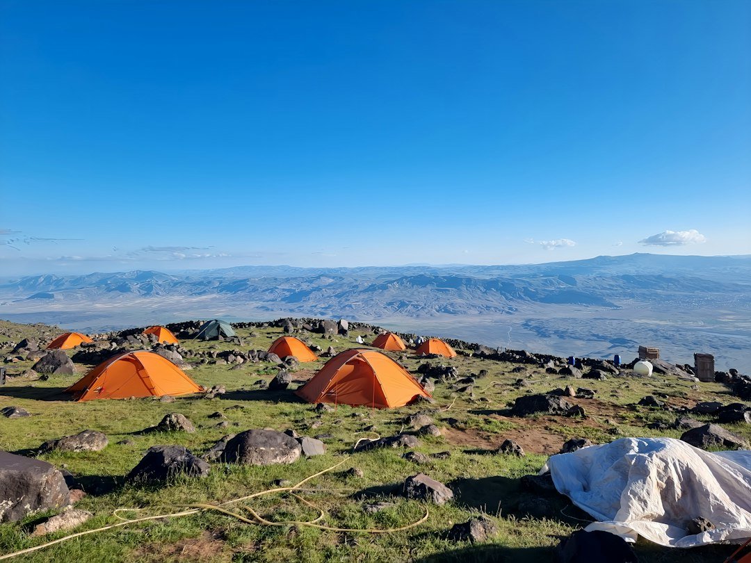 Colourful tents at a Kilimanjaro mountain camp — seven-day Umbwe climbing illustration